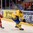 MINSK, BELARUS - MAY 10: Sweden's Dick Axelsson #28 stickhandles the puck with Denmark's Emil Kristensen #28 chasing during preliminary round action at the 2014 IIHF Ice Hockey World Championship. (Photo by Richard Wolowicz/HHOF-IIHF Images)


